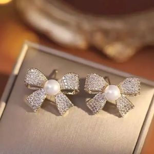 Elegant bow tie stud earrings.